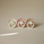 Mushie FRIGG Daisy Night Glow Natural Rubber Pacifier 2-Pack - Blush/Cream 0-6M on Luna Baby Store Miami