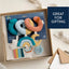 Itzy Ritzy Bitzy Spiral Car Seat - Rainbow on Luna Baby Store Miami