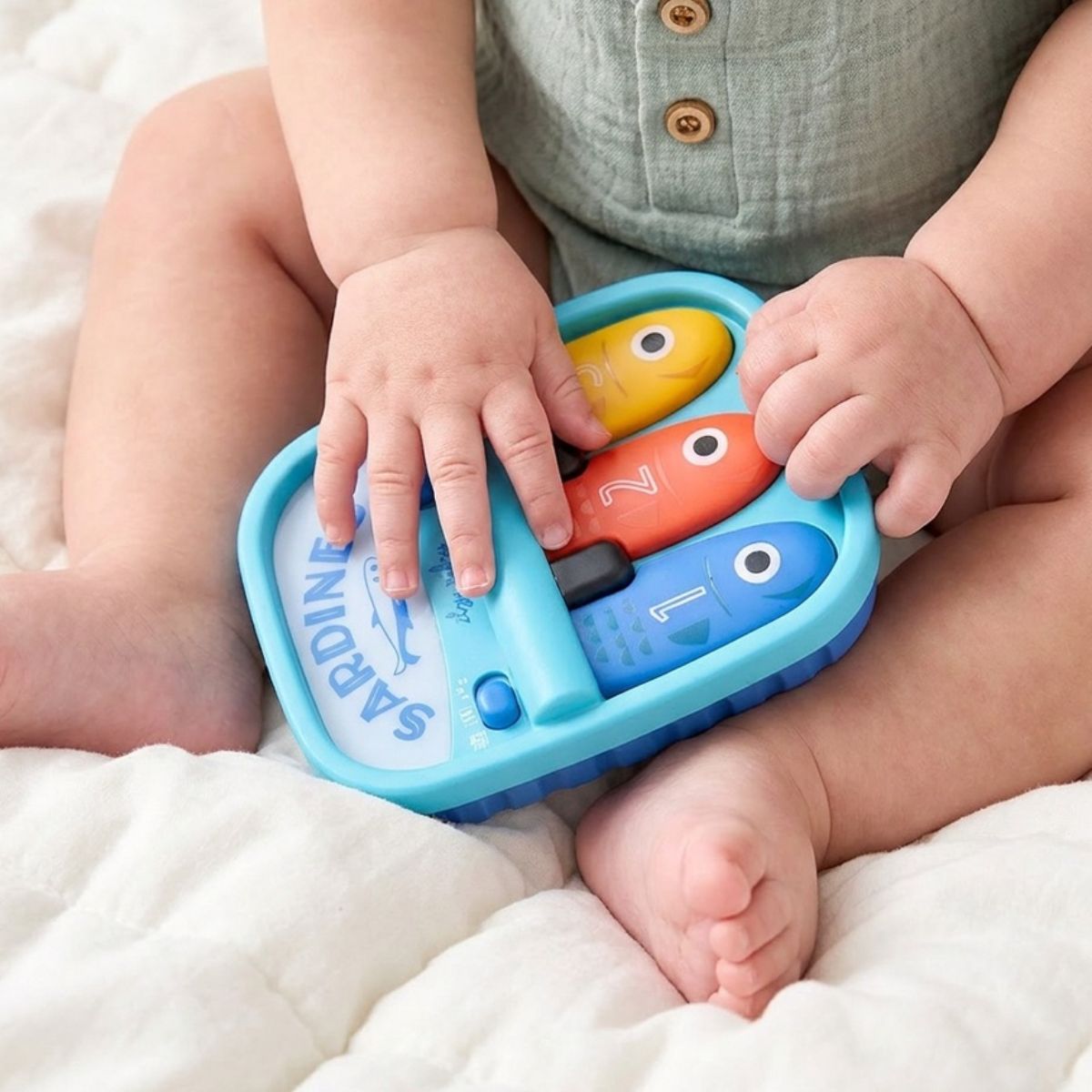 Itzy Ritzy Bitzy Tunes Sardines Baby Piano Toy on Luna Baby Store Miami