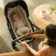 Nuna SWIV & TRIV Series Bassinet + Stand Caviar/Chocolate on Luna Baby Store Miami