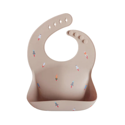 Babador de silicone para bebê Mushie - Rocket Ship