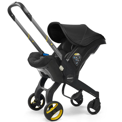 Cadeirinha de carro e carrinho de bebê Doona 